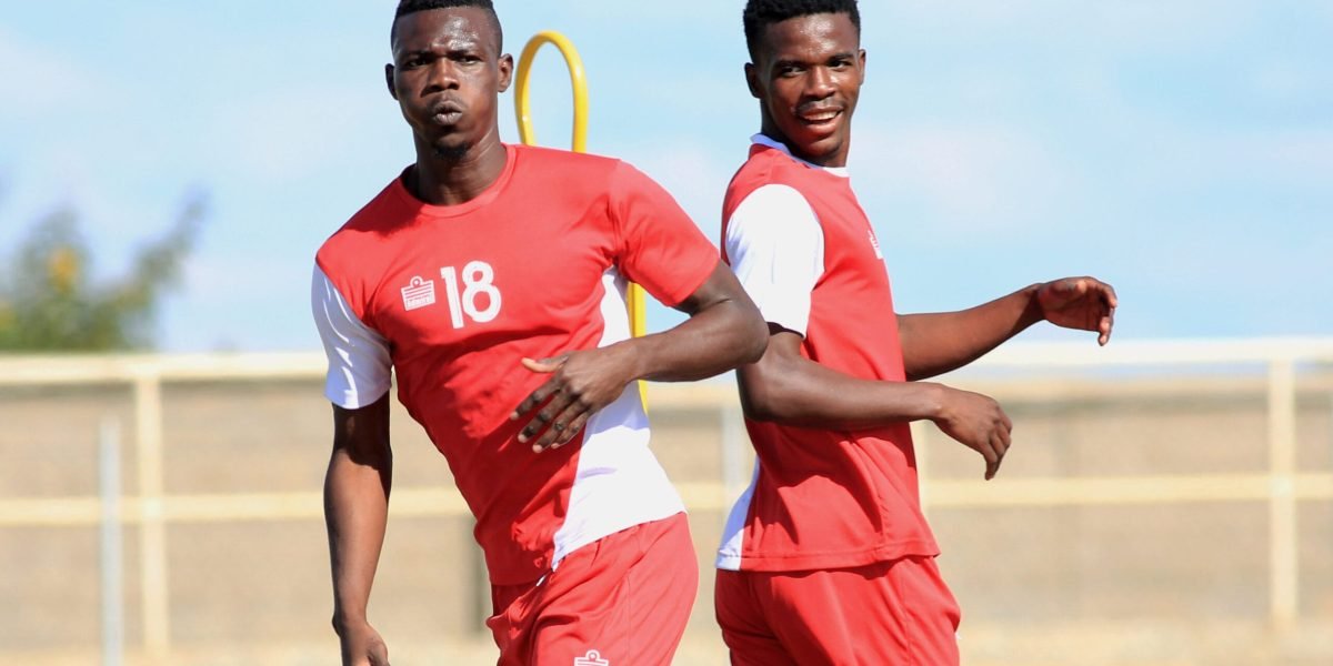 Babatunde Adepoju and Hassan Kajoke training at Kasungu Stadium for TN Stars