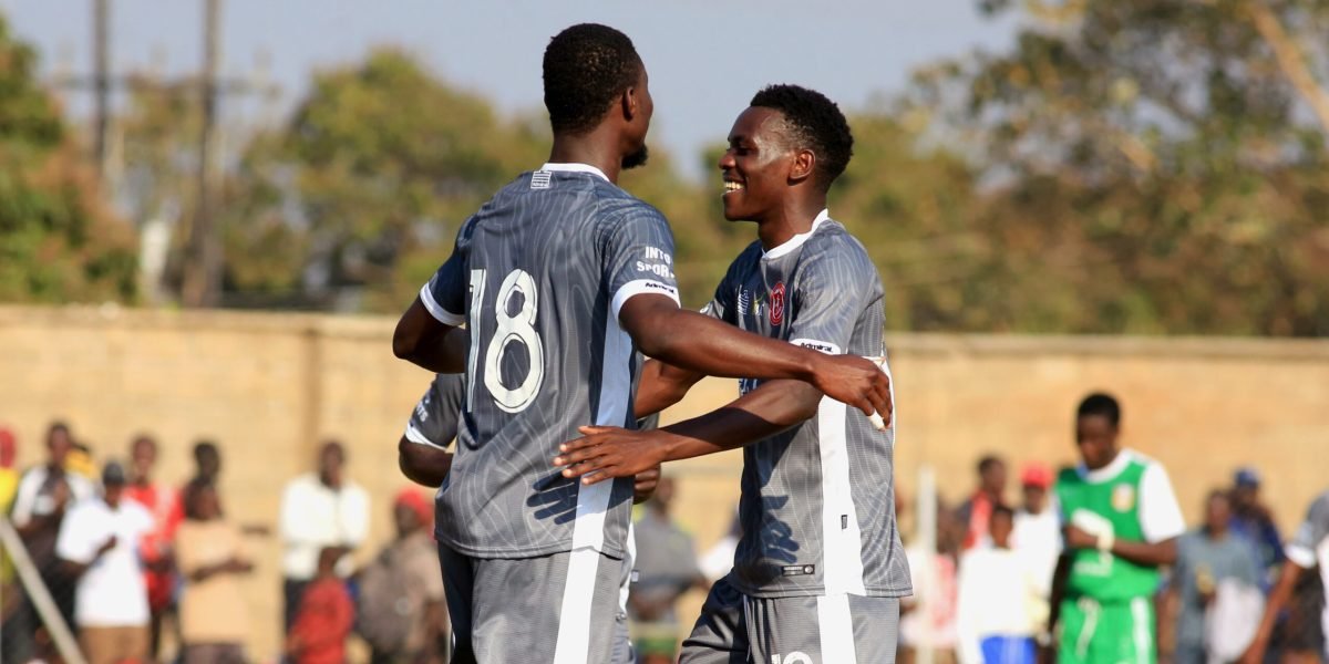 Babatunde Adepoju and Wongani Lungu celebrating the number 18's goal in the 5-0 thrashing of Chilumba Barracks