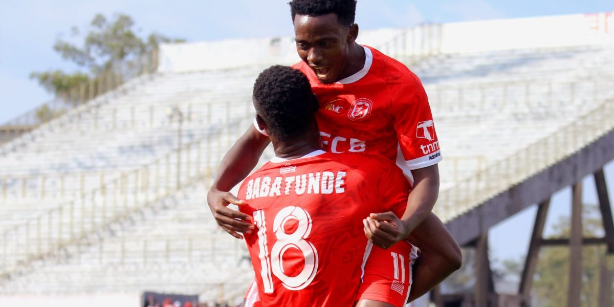 Babatunde and Salima celebrating after combining for a goal