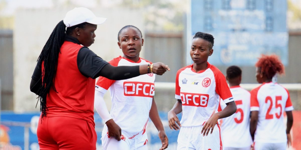 Bullets Women head coach Maggie Chombo talking to Tendai Sani and Matamando Makawa in a previous match