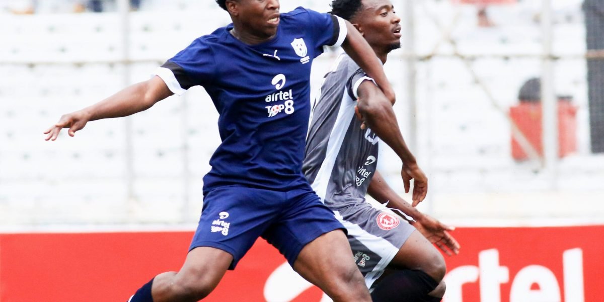 Creck Sporting Club defender Aaron Chilipa against FCB Nyasa Big Bullets attacker Chikumbutso Salima