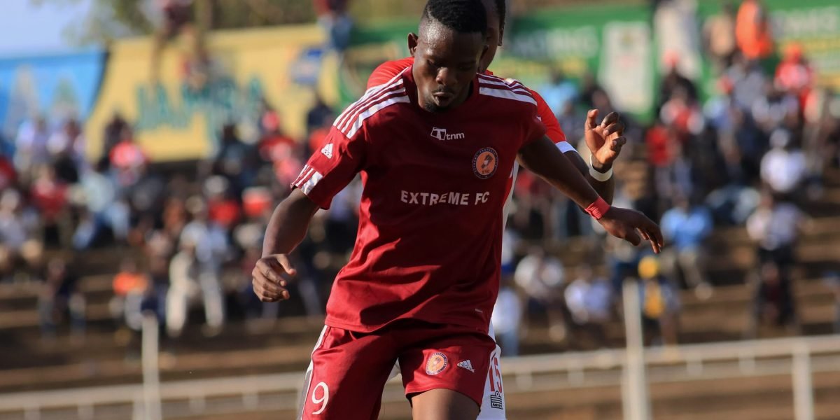 Ectreme FC forward Beston Jimu in action against FCB Nyasa Big Bullets in the FDH Bank Cup at Civo Stadium