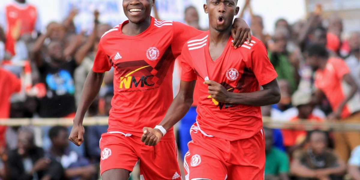 Emmanuel Savieli and Chikumbutso Salima celebrating one of Nyasa Big Bullets Reserves goals against Silver Strikers Reserves in the Aubrey Dimba Trophy final