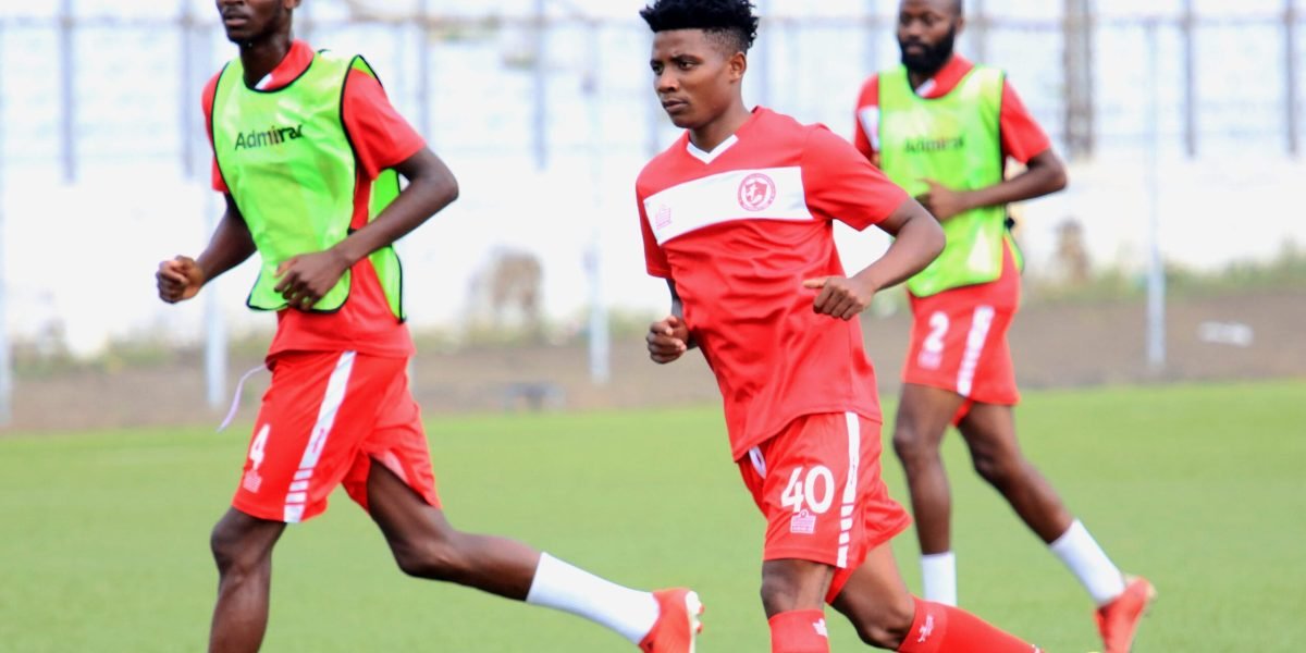 FCB Nyasa Big Bullets' Blessings Mpokera, Peter Banda and Eric Kaonga warming up for action at Kamuzu Stadium