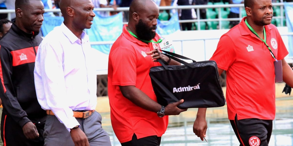 FCB Nyasa Big Bullets Head Coach Kalisto Pasuwa with assistant coach Heston Munthali, performance analyst Michael Ngore and goalkeepers coach Vincent Gona