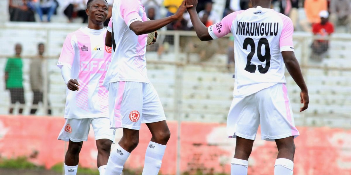 FCB Nyasa Big Bullets' Mike Mkwate, Righteous Banda and Patrick Mwaungulu celebrating one of the goals as they beat Red Lions 5-1 in a pre-season friendly at Kamuzu Stadium
