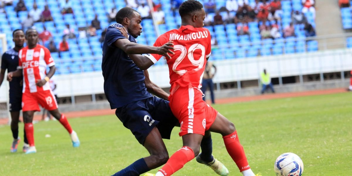 FCB Nyasa Big Bullets' Patrick Mwaungulu in the thick of things against Blue Eagles in the Airtel Top 8 semi-final tie at Bingu National Stadium