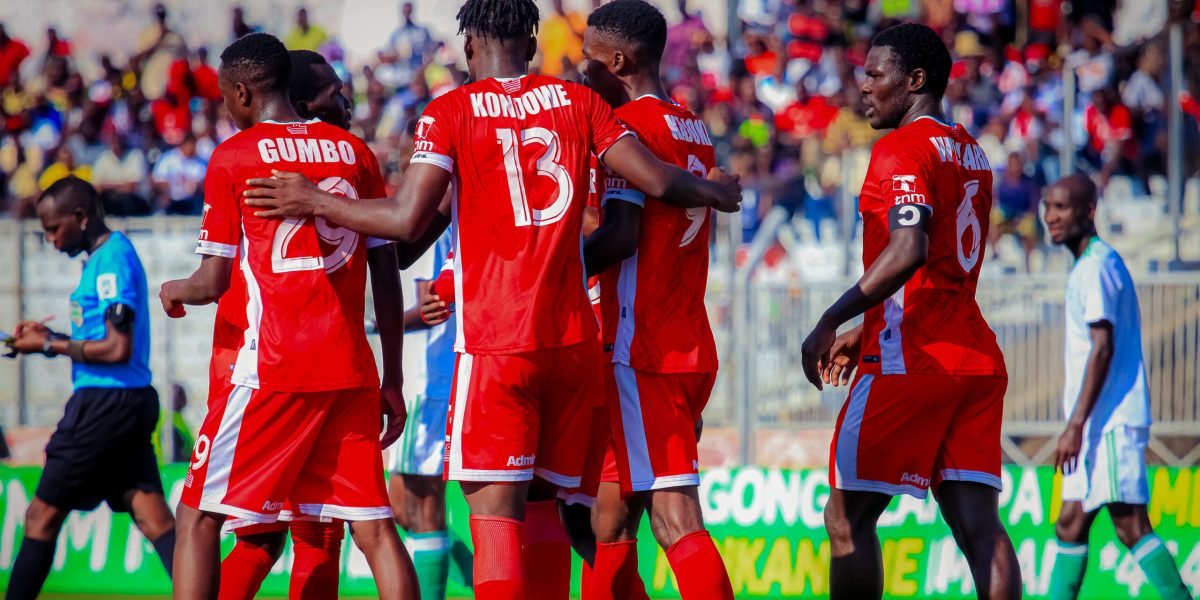 FCB Nyasa Big Bullets Players Celebrate on a Bright Afternoon at Kamuzu Stadium led by captain Frank Willard