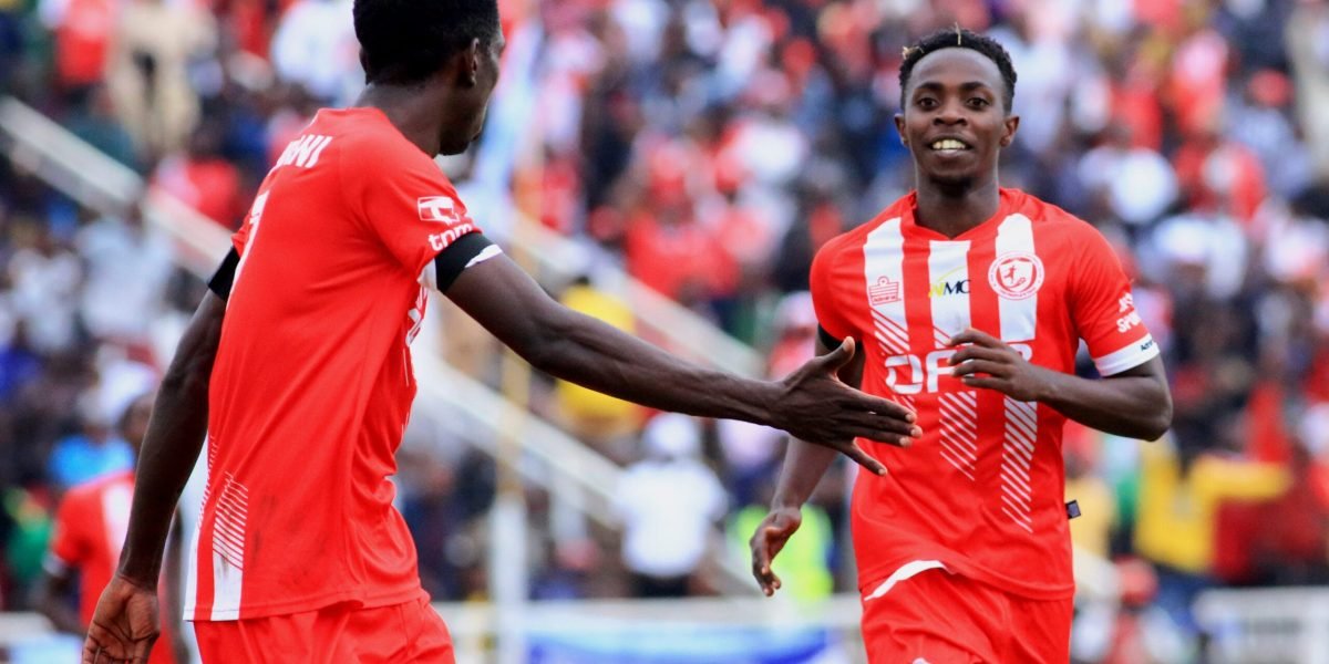Captain Precious Sambani joins Patrick Mwaungulu celebrating the midfielder's goal against Creck Sporting Club. Photo by Kimpho Loka/Bullets Media.