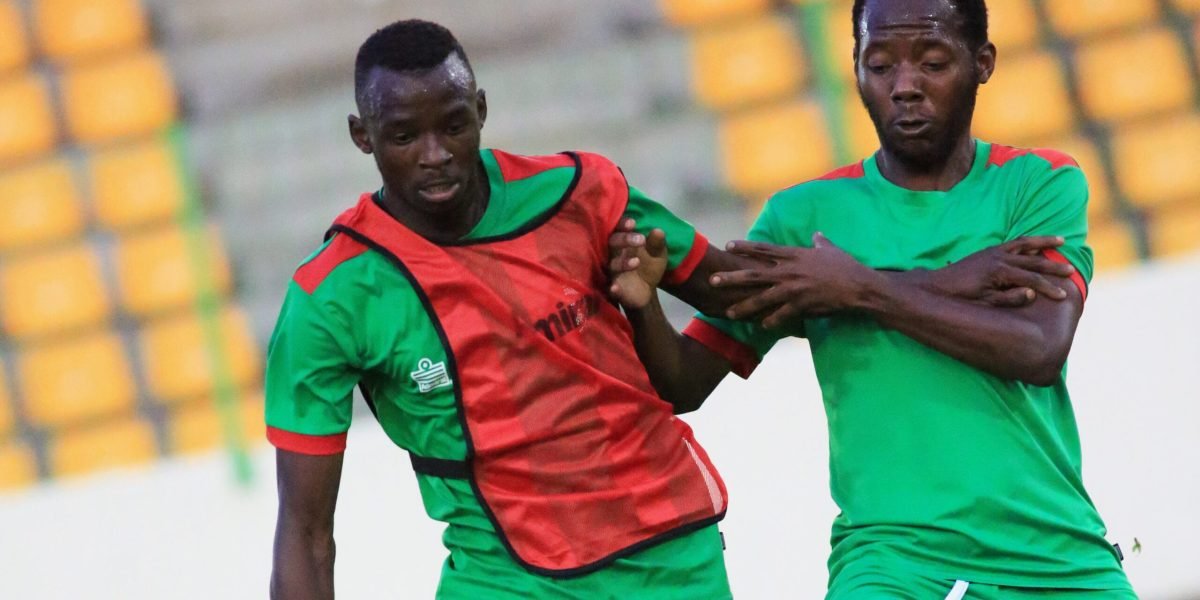 FCB Nyasa Big Bullets defender Blessings Mpokera and midfielder Kenneth Pasuwa training at Malabo Stadium ahead of the CAF Champions League match against Dragon FC of Equatorial Guinea