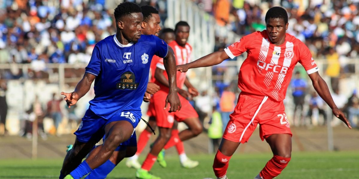 FCB Nyasa Big Bullets defender Chrispin Mapemba and Mighty Mukuru Wanderers midfielder Gaddie Chirwa in the thick of things in the opening round of the 2024 TNM Super League