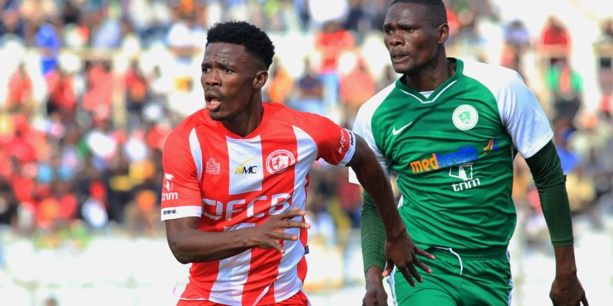 FCB Nyasa Big Bullets forward Hassan Kajoke against Moyale's Maneno Nyoni in the 2023 TNM Super League campaign at Kamuzu Stadium