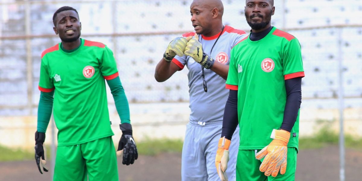 FCB Nyasa Big Bullets goalkeepers Richard Chimbamba and Rabson Chiyenda with trainer Vincent Gona preparing for Mafco