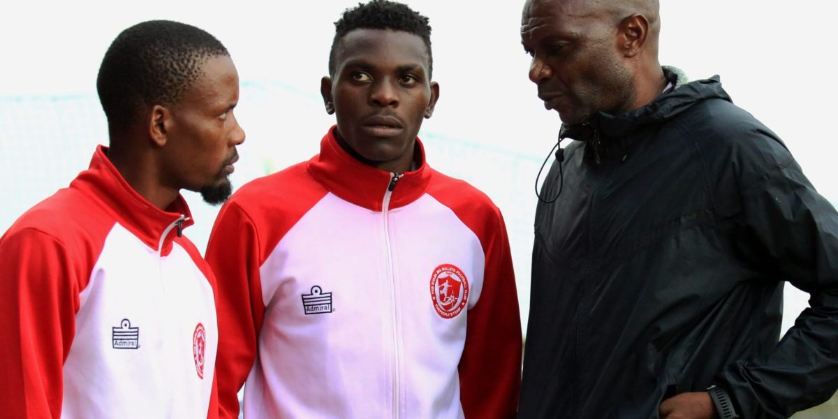 FCB Nyasa Big Bullets head coach Kalisto Pasuwa and his midfielders Ernest Petro and Wongani Lungu