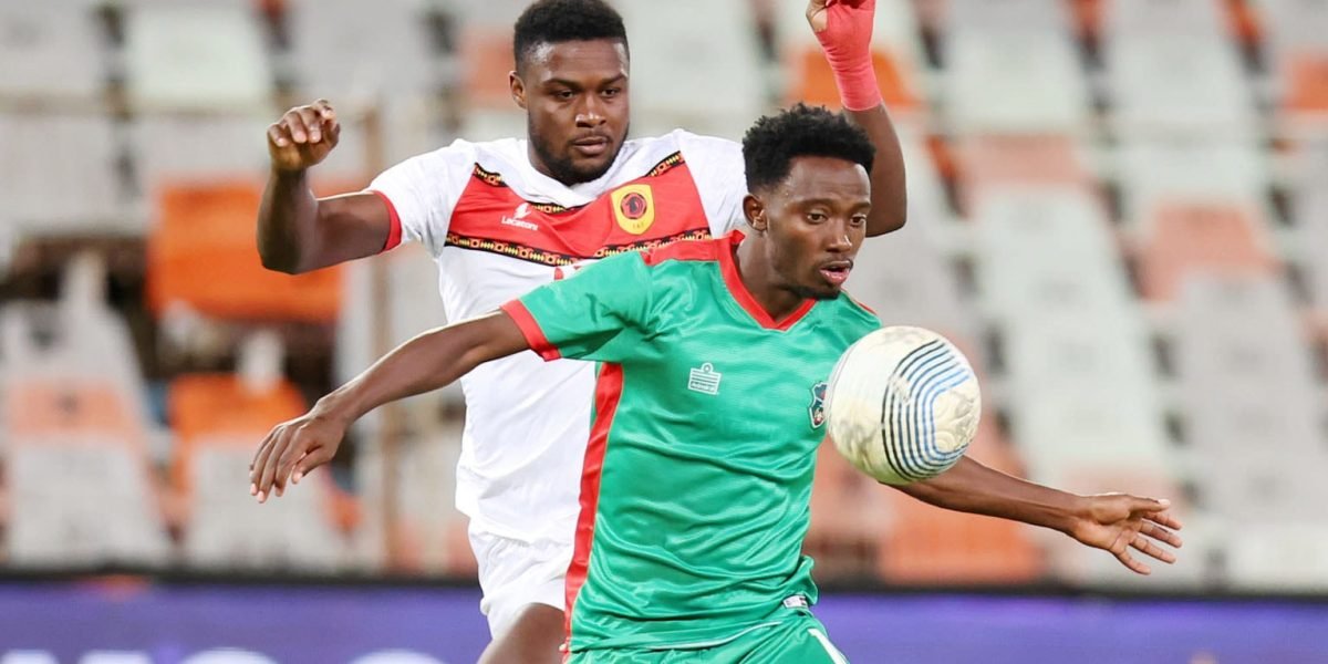 Chikumbutso Salima of Malawi challenged by Pedro Bondo Francisco of Angola during the 2025 HollywoodBets COSAFA Cup match between Malawi and Angola at the Free State Stadium, Bloemfontein on the 10 June 2025 ©Muzi Ntombela/BackpagePix