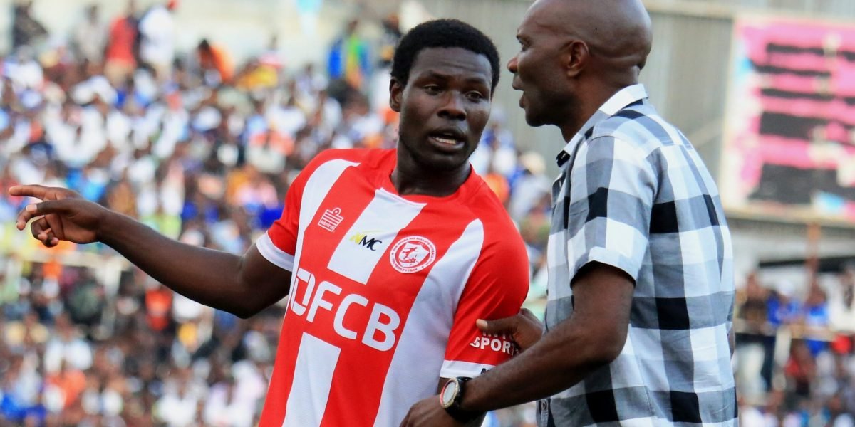 FCB Nyasa Big Bullets midfielder Frank Willard and head coach Kalisto Pasuwa