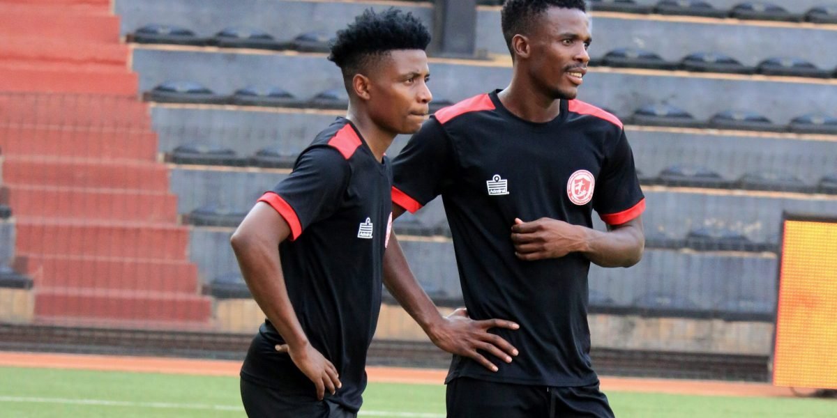 FCB Nyasa Big Bullets midfielder Peter Banda and forward Hassan Kajoke captured at Stade TP Mazembe in DRC