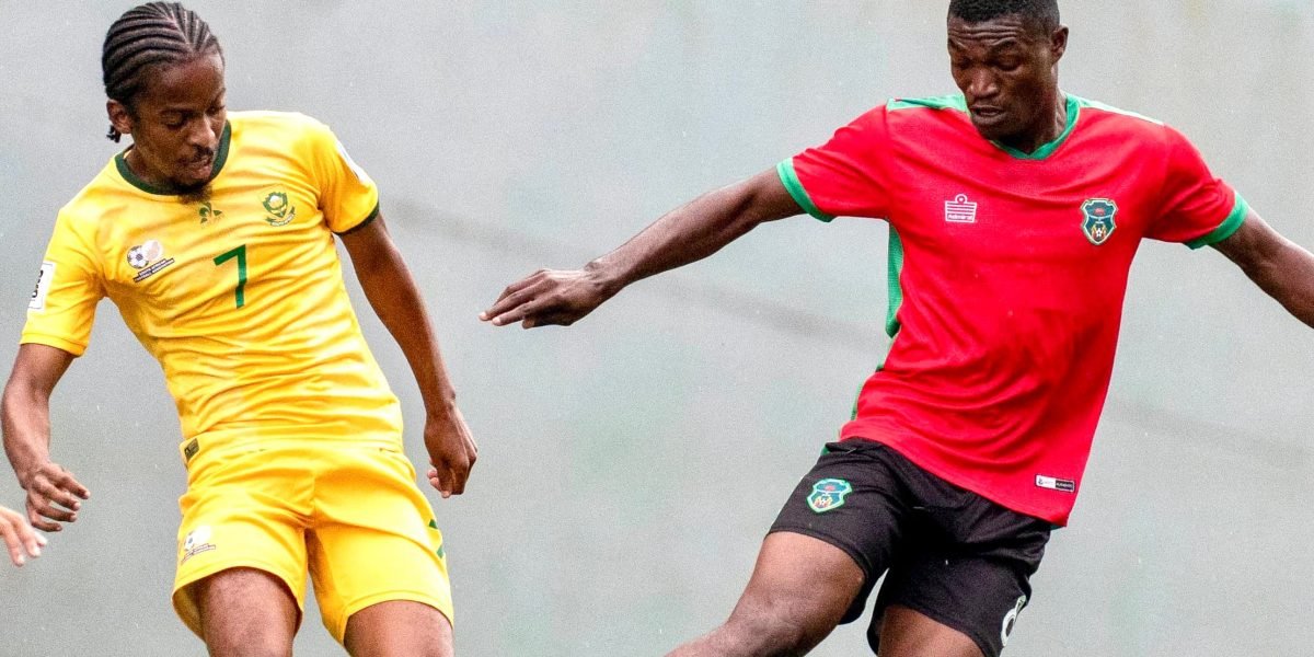 FCB Nyasa Big Bullets midfielder Yankho Singo on international duty for Malawi against South Africa's Kamohelo Mahlatsi copy