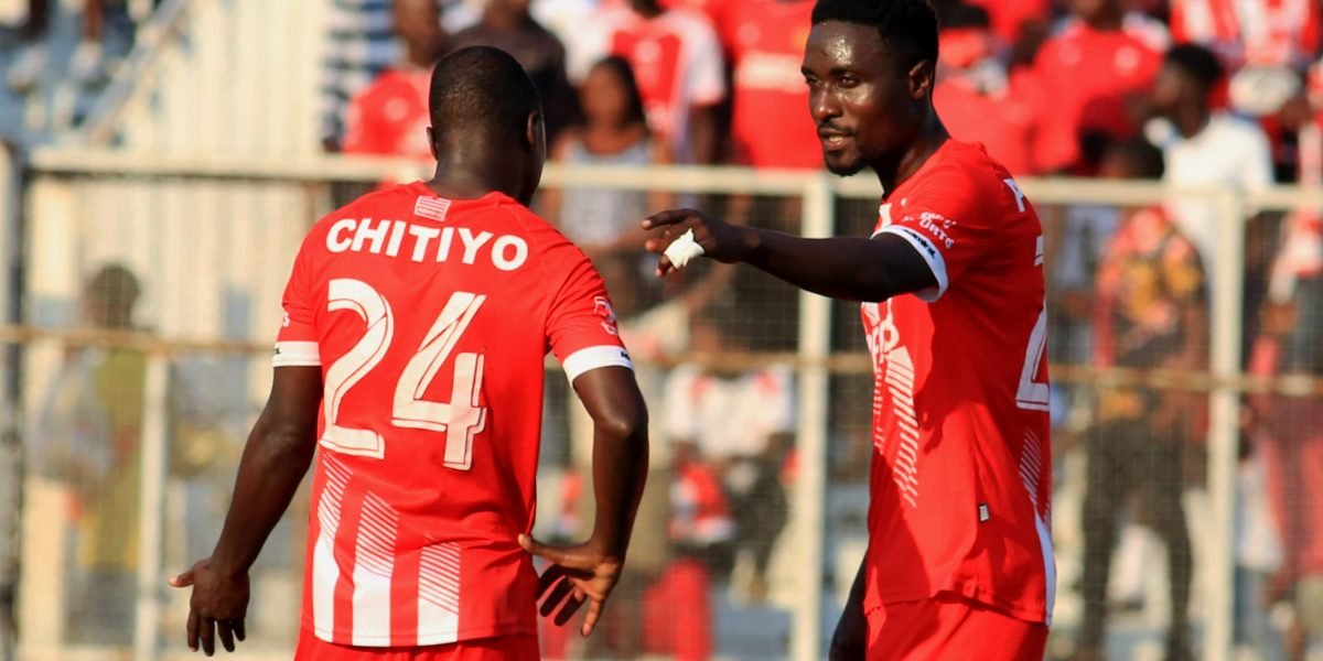 FCB Nyasa Big Bullets midfielders Ronald Chitiyo and Precious Phiri in a TNM Super League match against Moyale Barracks
