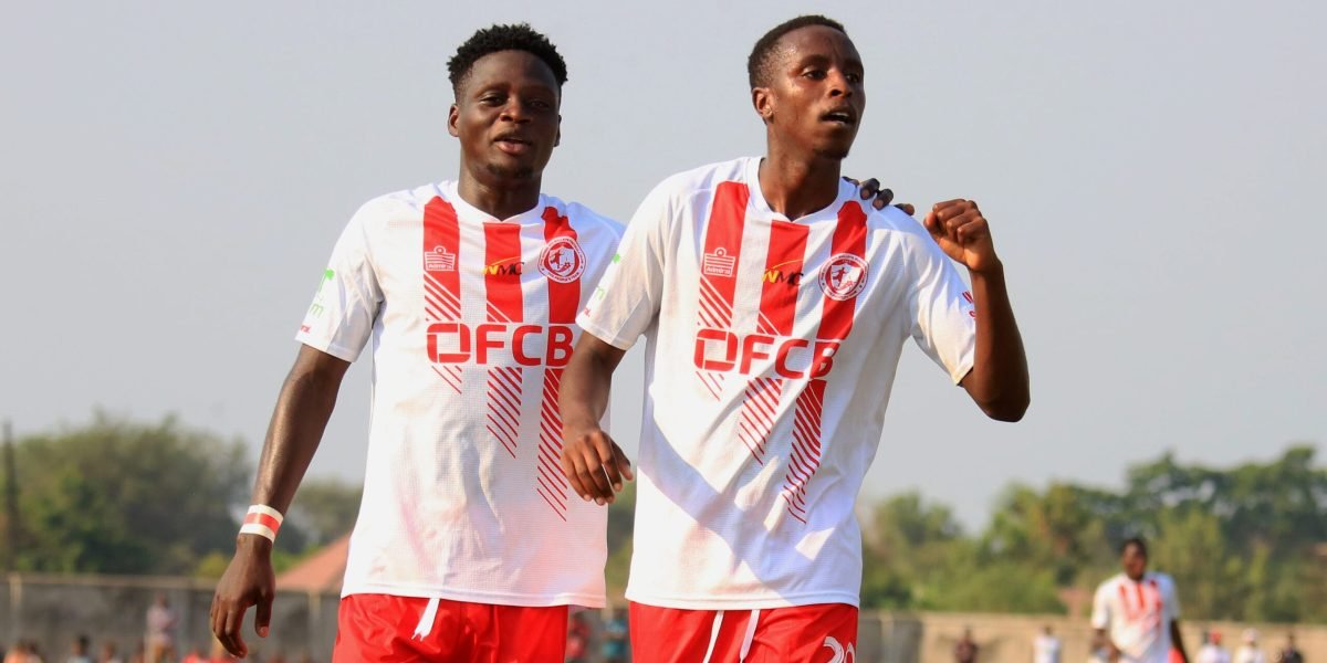FCB Nyasa Big Bullets midfielders Stanley Billiat and Chawanangwa Gumbo celebrating the lone goal againt Baka City in the TNM Super League