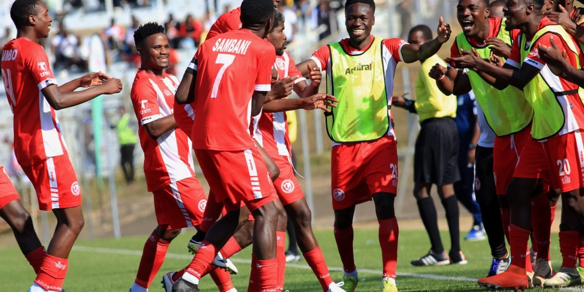 FCB Nyasa Big Bullets players celebrating Yamikani Fodya's goal against Blue Eagles in the TNM Super League