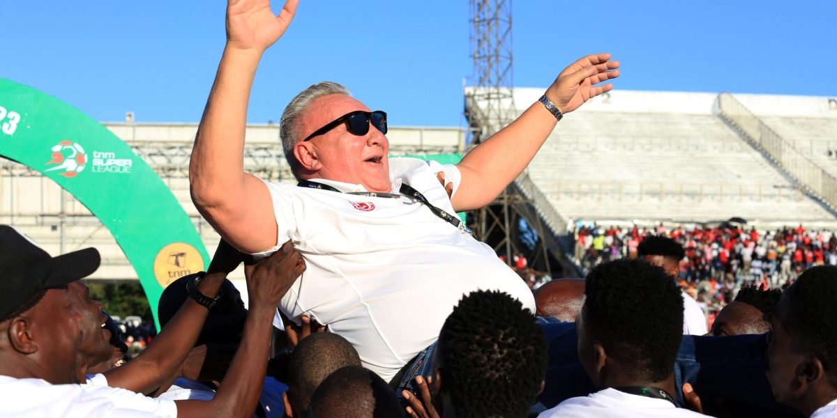 FCB Nyasa Big Bullets president Konrad Buckle is thrown in the air as The People's Team celebrate winning the 2023 TNM Super League