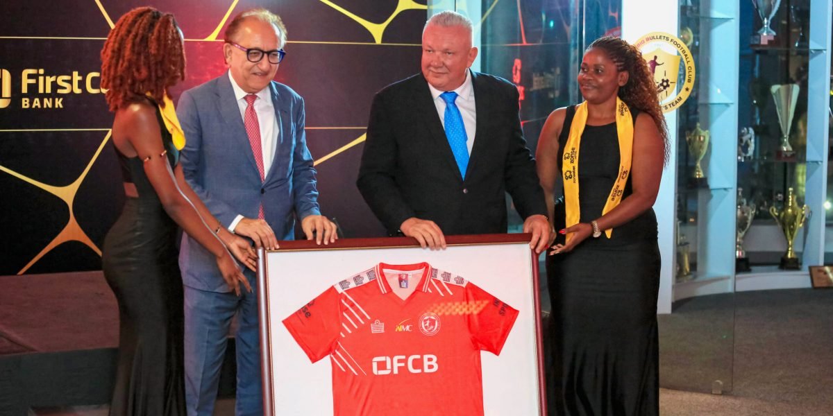 First Capital Bank founder Hitesh Anadkat and FCB Nyasa Big Bullets president Konrad Buckle unveiling the 2026-27 home jersey