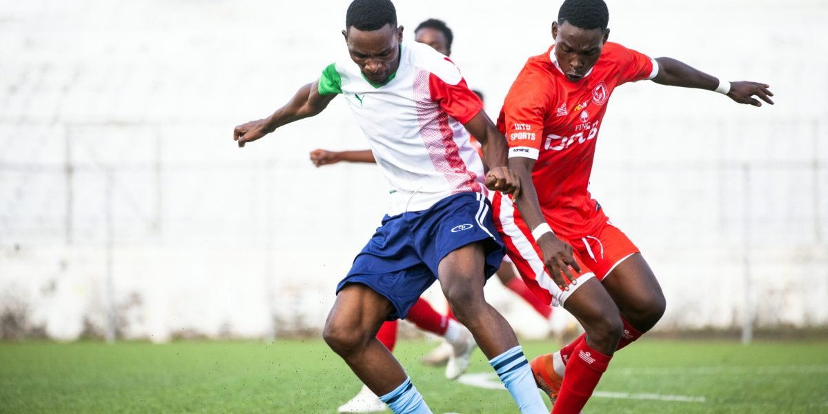 Francis Malikebu battles for the ball as the FCB Nyasa Big Bullets Reserves midfielder scored a hattrick over Mwanza United