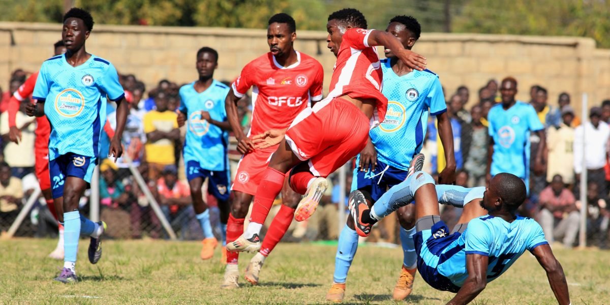Henry Chiwaya rises high to head the ball against Chitipa United at Chitipa Stadium