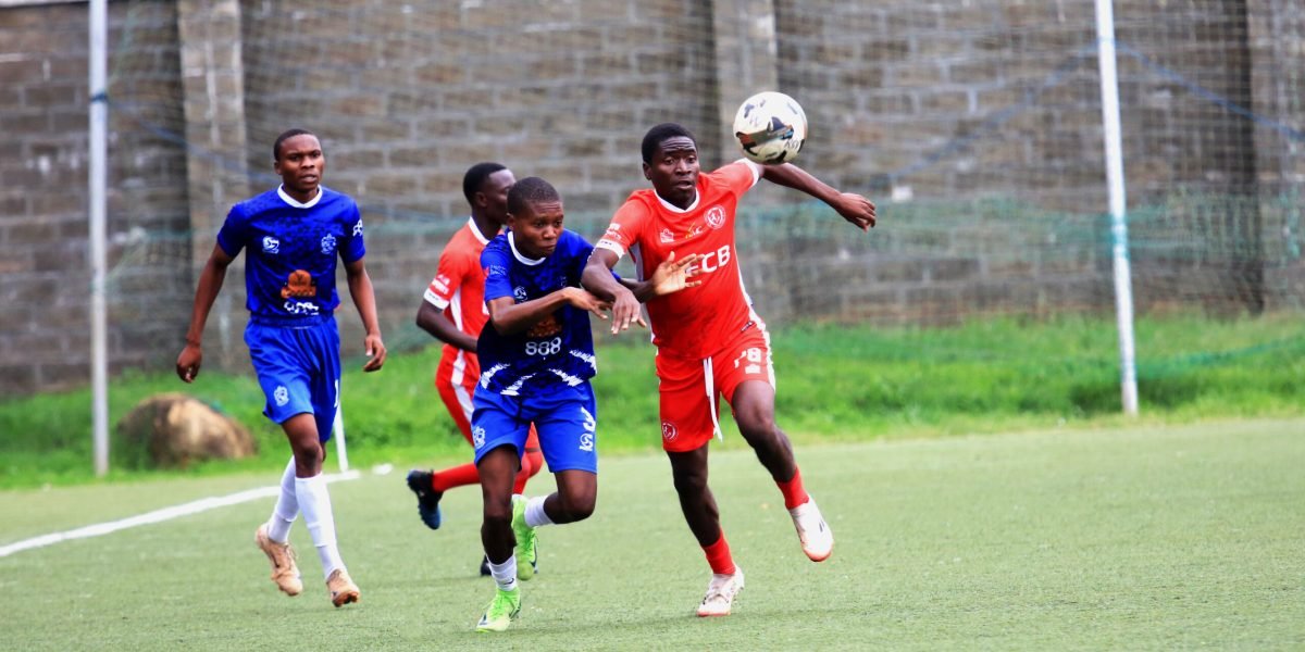 Jazeel Bannet battles for possession against Wanderers Youth in the Blantyre U19 mini-derby at Mpira Stadium