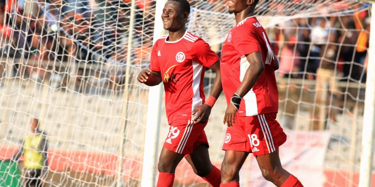 Lanjesi Nkhoma and Babatunde Adepoju celebrating one of Bullets goals against Mighty Tigers