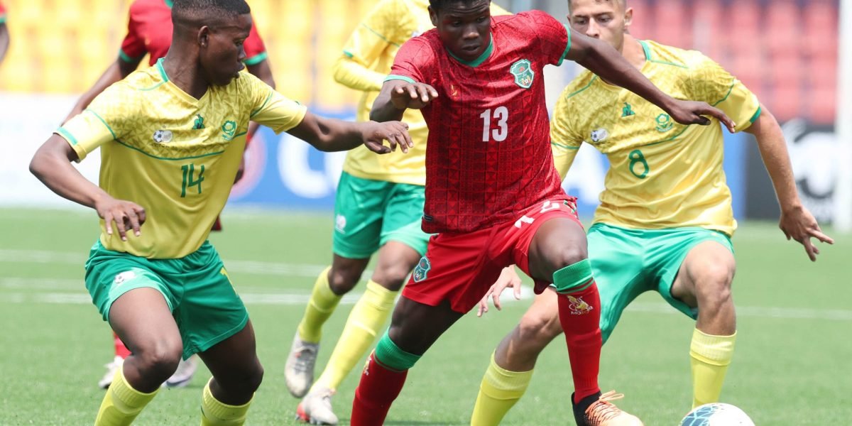 Chrispine Mapemba challenged by /s14/ during the TotalEnergies AFCON U20 Eqypt 2023 | COSAFA Qualifier match between South Africa and Malawi at Somhlolo Stadium, in Eswatini on the 08 October 2022 ©Samuel Shivambu/BackpagePix