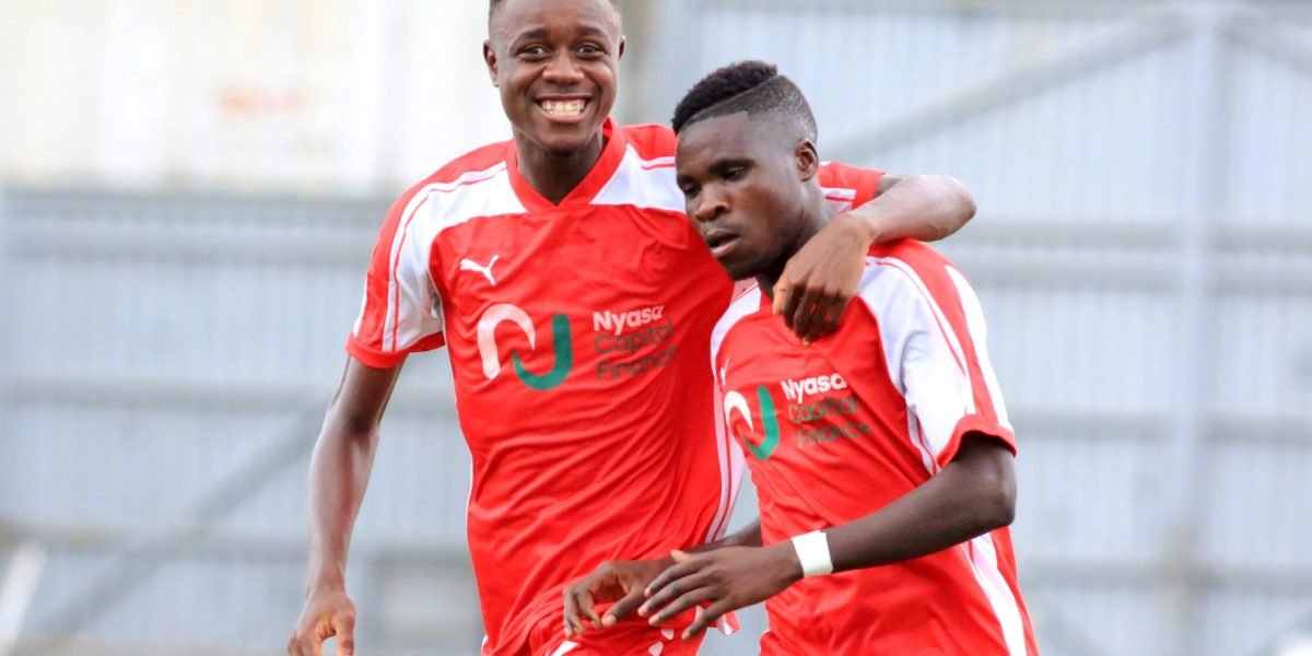 Mussah Bwanali and Emmanuel Saviel celebrating Nyasa Big Bullets Reserves' first goal against Ndirande Stars in the Nyasa Capital Finance Cup final at Kamuzu Stadium