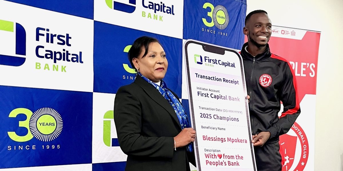 Nargis Khan, head of Prestige Banking at FCB presenting a cheque to Blessings Mpokera