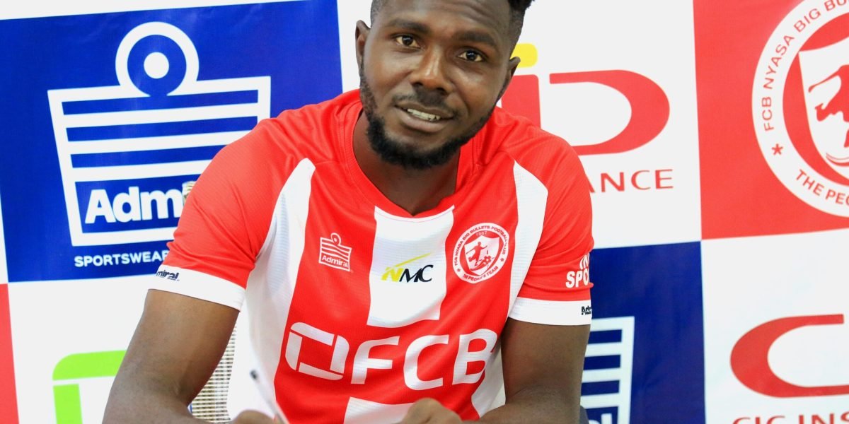 Nigerian forward Chinedu Okafor completes FCB Nyasa Big Bullets move.