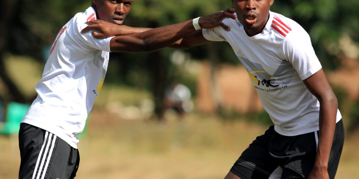 Nyasa Big Bullets Reserves forward Wongani Kaponya and defender Chifundo Sapuwa