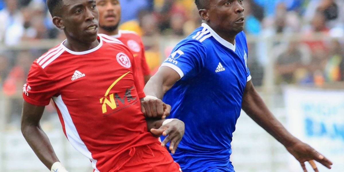 Nyasa Big Bullets defender Precious Sambani in action against Mighty Mukuru Wanderers forward Chiukepo Msowoya
