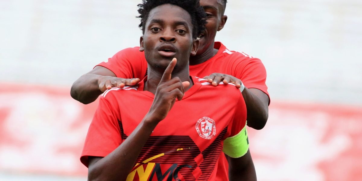 Nyasa Big Bullets defender and captain Yamikani Mologeni celebrating his goal against Prison United at Kamuzu Stadium