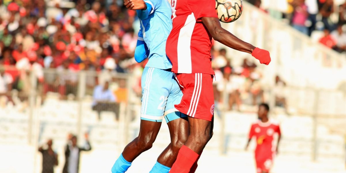 Nyasa Big Bullets forward Babatunde Adepoju against Silver Strikers defender Nixon Mwase in the TNM Super League