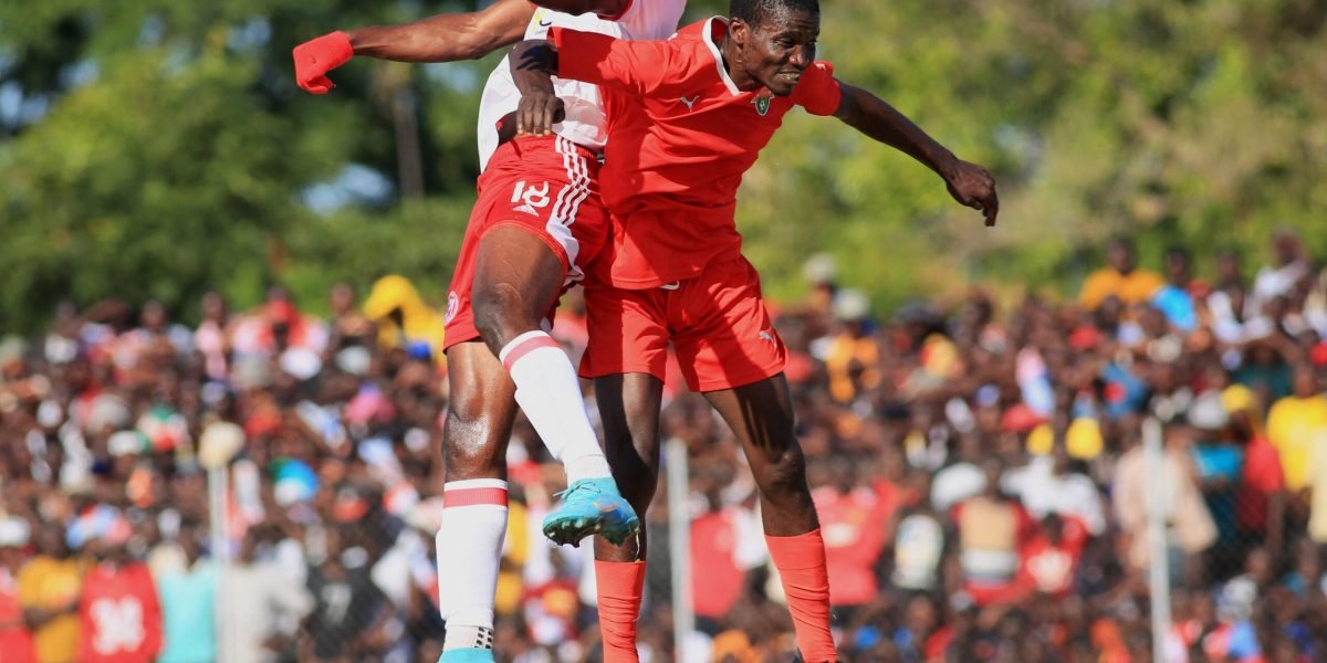Nyasa Big Bullets forward Babatunde Adepoju fights for the ball against TN Stars