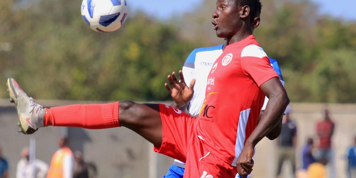Nyasa Big Bullets forward Lanjesi Nkhoma in action against Karonga United in the Airtel Top 8 quaterfinal return leg