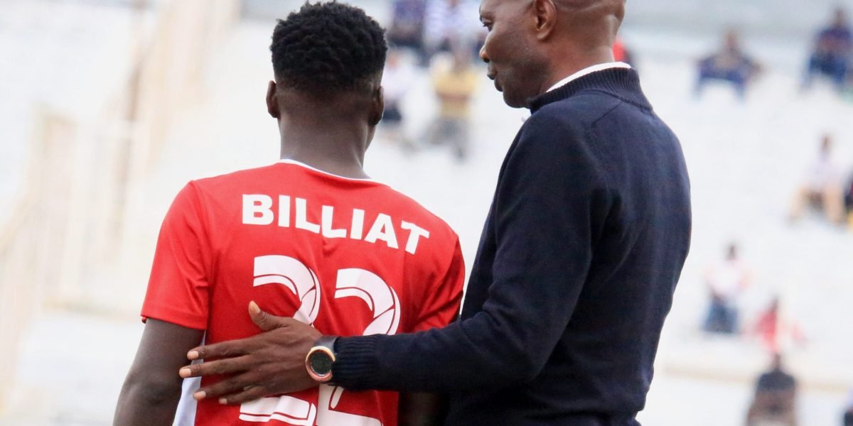 Nyasa Big Bullets head coach Kalisto Pasuwa giving instructions to midfielder Stanley Billiat