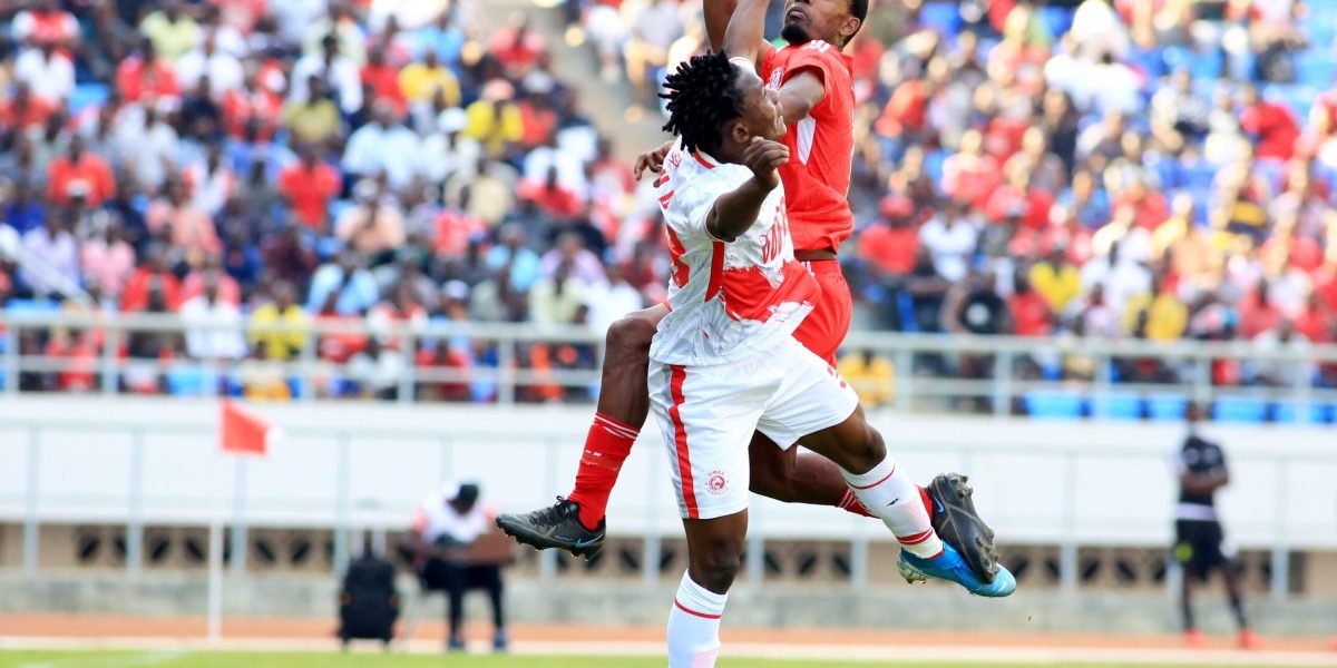 Nyasa Big Bullets midfielder Ernest Petro in aerial combat against Simba SC in the CAF Champions League