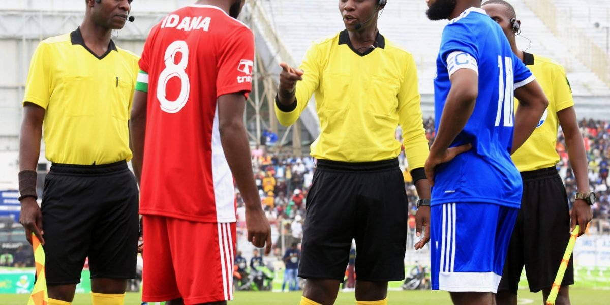 Referee-Alfred-Kaphamtengo-and-his-assistants-Joseph-Nyauti-and-Pondamali-Tembo-during-the-Blantyre-derby