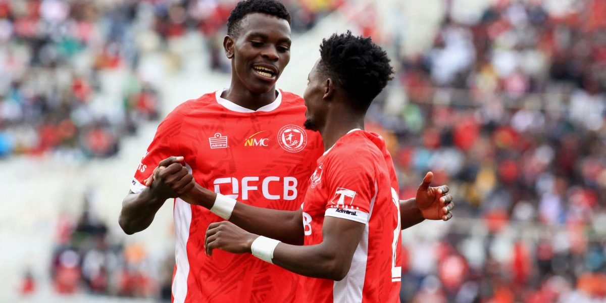 Yamikani Mologeni celebrating a goal in a TNM Super League action at Kamuzu Stadium